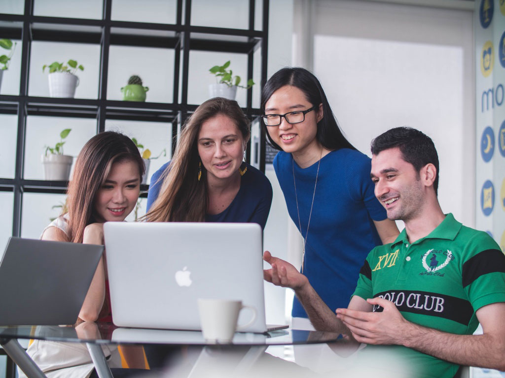 Marketing team reviewing sales content